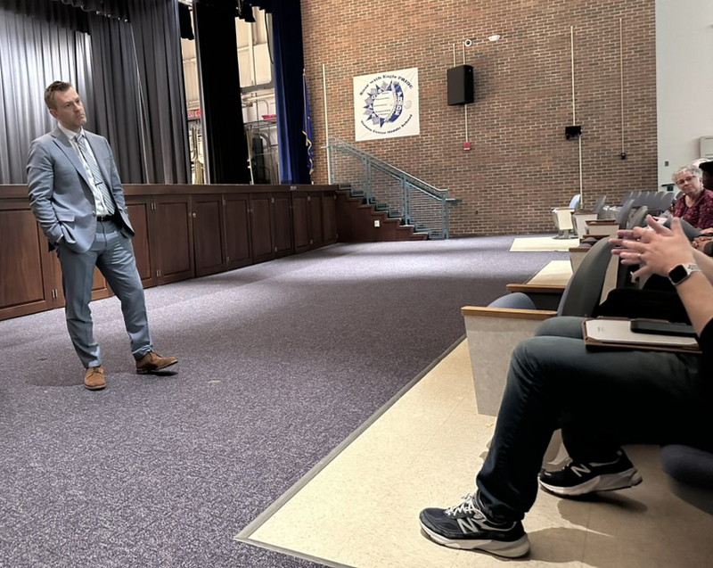 From the left, Josh Elliott pumps up his challenge to Ned Lamont
