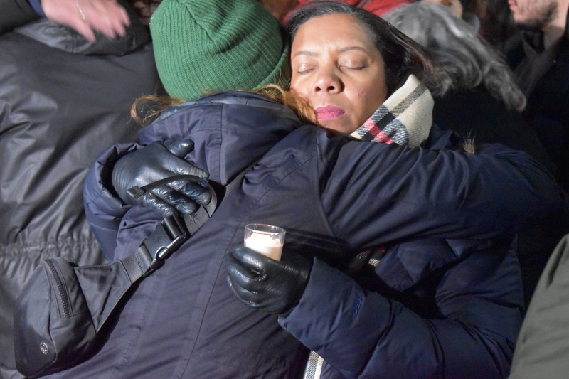 A community in grief gathers to hold light in ‘one of Providence’s darkest times’