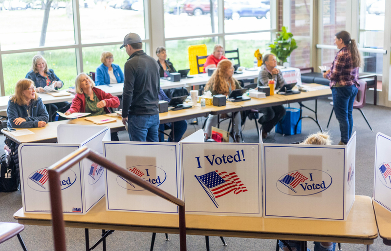 Residents take part in the voting process for the primary election on May 21, 2024, at Hillcrest High School in Idaho Falls