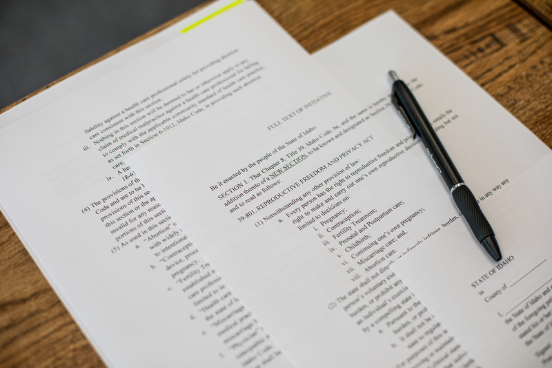 Photos of the official petition for a ballot initiative to restore abortion access in Idaho