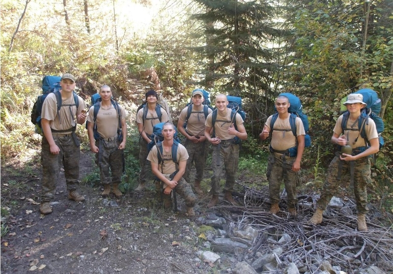 Idaho Youth Challenge Academy students stop for a photo during their backpacking trip with the Great Burn Conservation Alliance at Kelly Creek