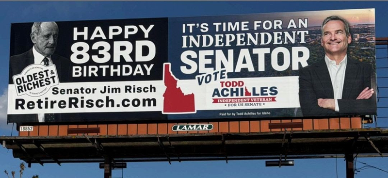 A billboard purchased by the Todd Achilles campaign for Sen. Jim Risch's 83rd birthday, calling the senator the state's "oldest and richest." (Photo from the Achilles campaign)