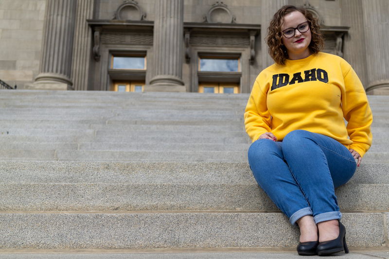 University of Idaho law student Desalyn Swank poses for a photo on the front steps of the Idaho State Capitol.