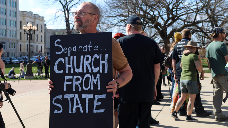 Mike Trapp of Leavenworth said he took part in combative rallies outside the Kansas Capitol to express his view that government needed to respect the constitutional mandate to maintain separation of church and state. He said the rise of Christian nationalists was the greatest threat to democracy. (Grace Hills/Kansas Reflector)
