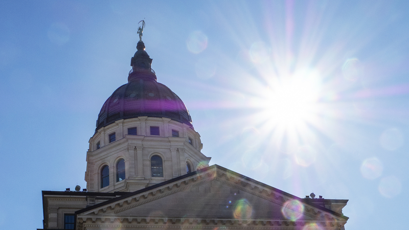 A bright shine rises March 5, 2025, behind the Kansas Statehouse dome