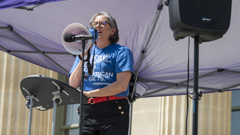 Christy Davis addresses the No Kings rally on June 14, 2025, from the south steps of the Statehouse in Topeka, where she announced she will explore a U.S. Senate run as a Democrat against incumbent Republican U.S. Sen. Roger Marshall.