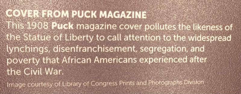 An image from the Statue of Liberty National Monument, titled “Cover of Puck Magazine sign."