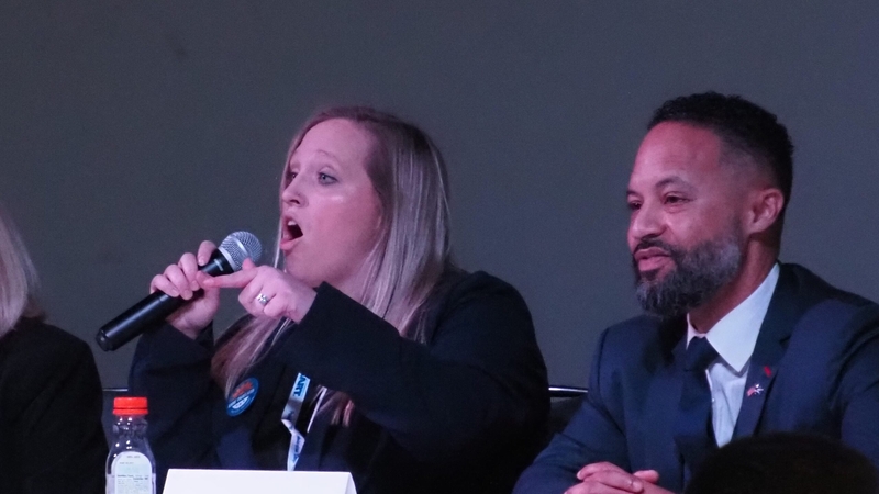 Democratic candidate Anne Parelkar states her point about Kansans needing better representation in Washington, D.C., at the Kansas Democratic Party's annual convention March 8, 2026.