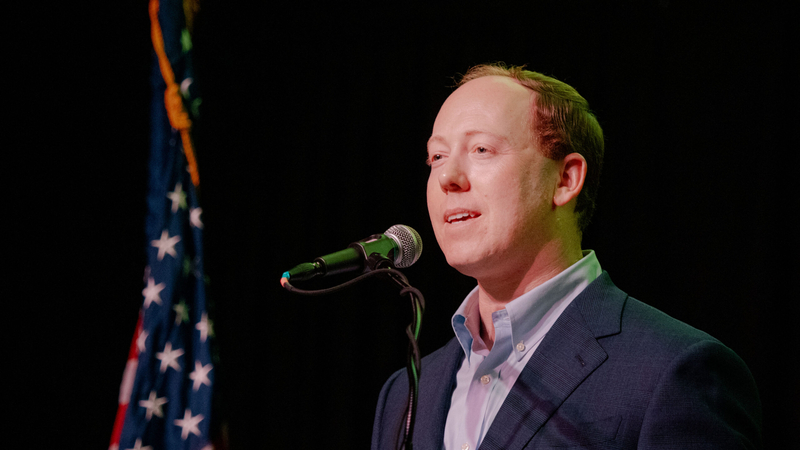 Sen. Ethan Corson says he knows what it means for higher education and owning a home to feel inaccessible during an April 26, 2026, forum at the Aztec Shawnee Theater.