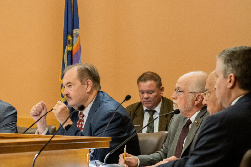 Senate Vice President Tim Shallenburger speaks to Will Lawrence, Gov. Laura Kelly's chief of staff, about hantavirus during a Legislative Coordinating Council Meeting on May 25, 2026