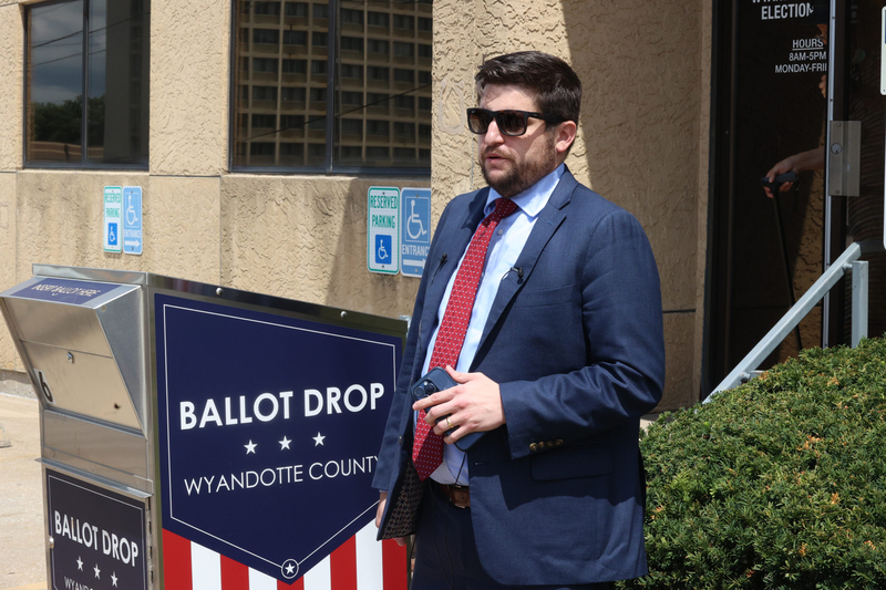 Jake Miller, voter protection director for the Kansas Democratic Party, answers questions from reporters July 31, 2026, outside of the Wyandotte County Election Office.