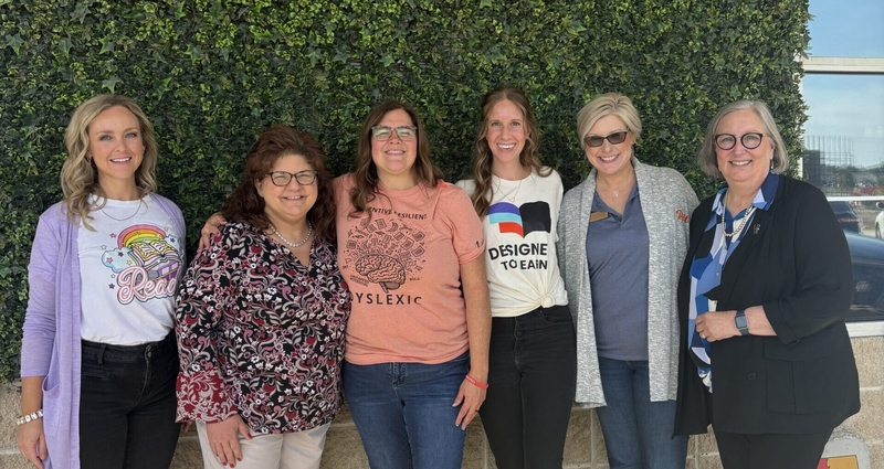 Alana McWilliams, third from left, works with other literacy advocates at a 2025 International Dyslexia Association conference. (Photo submitted by Alana McWilliams)