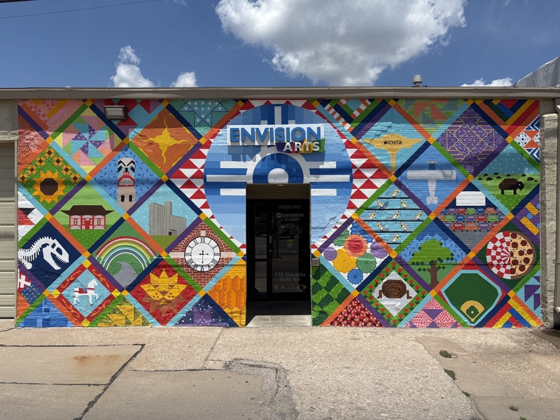 Envision Arts' building in Wichita sports a mural designed to look like a quilt that shows pieces of the community.