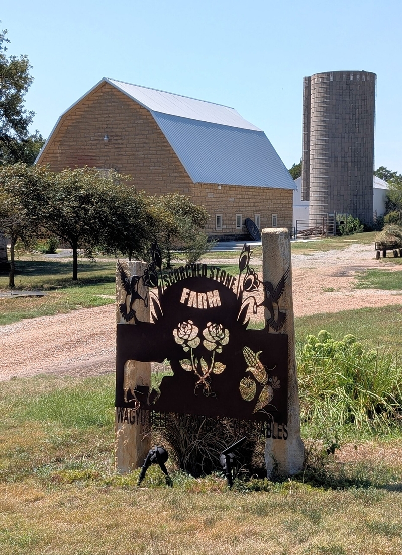 This sign denotes the name of Jim and Katie Homolka’s Scorched Stone Farm in northeastern Barton County. The name comes from the fire that gutted the limestone barn and charred the stone walls.