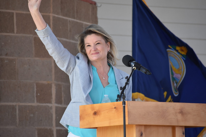 Democratic gubernatorial nominee Cindy Holscher contends her GOP opponent, Ty Masterson, should be linked to controversial tax policy advanced by former Gov. Sam Brownback in 2012. Holscher voted with a bipartisan coalition in 2017 to repeal Brownback's tax program, while Masterson opposed the legislation. This is an image of Holscher at the Kansas State Fair debate on Sept. 12, 2026. (Photo by Jill Hummels for Kansas Reflector)