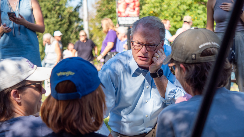 Adam Hamilton greets people at an Oct. 12, 2026, campaign event in Lawrence.