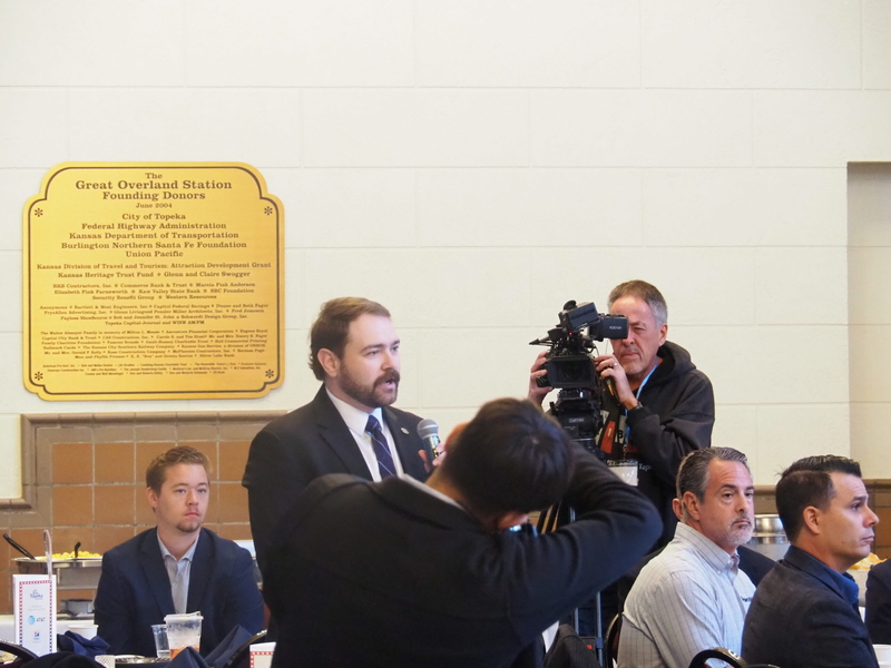 Zac Surritt, part of the third generation of family leadership at R&amp;S Maintenance in Meriden, questions U.S. Sen. Roger Marshall about tariffs during an Oct. 16, 2026, candidate forum at Great Overland Station in Topeka