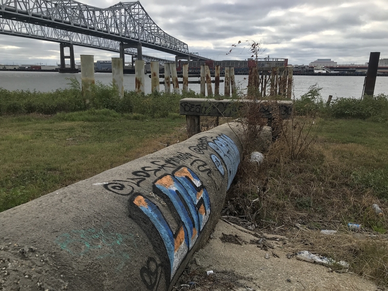 Graffiti covers a pipe that once pulled water from the Mississippi River at Algiers Intake Station 2.
