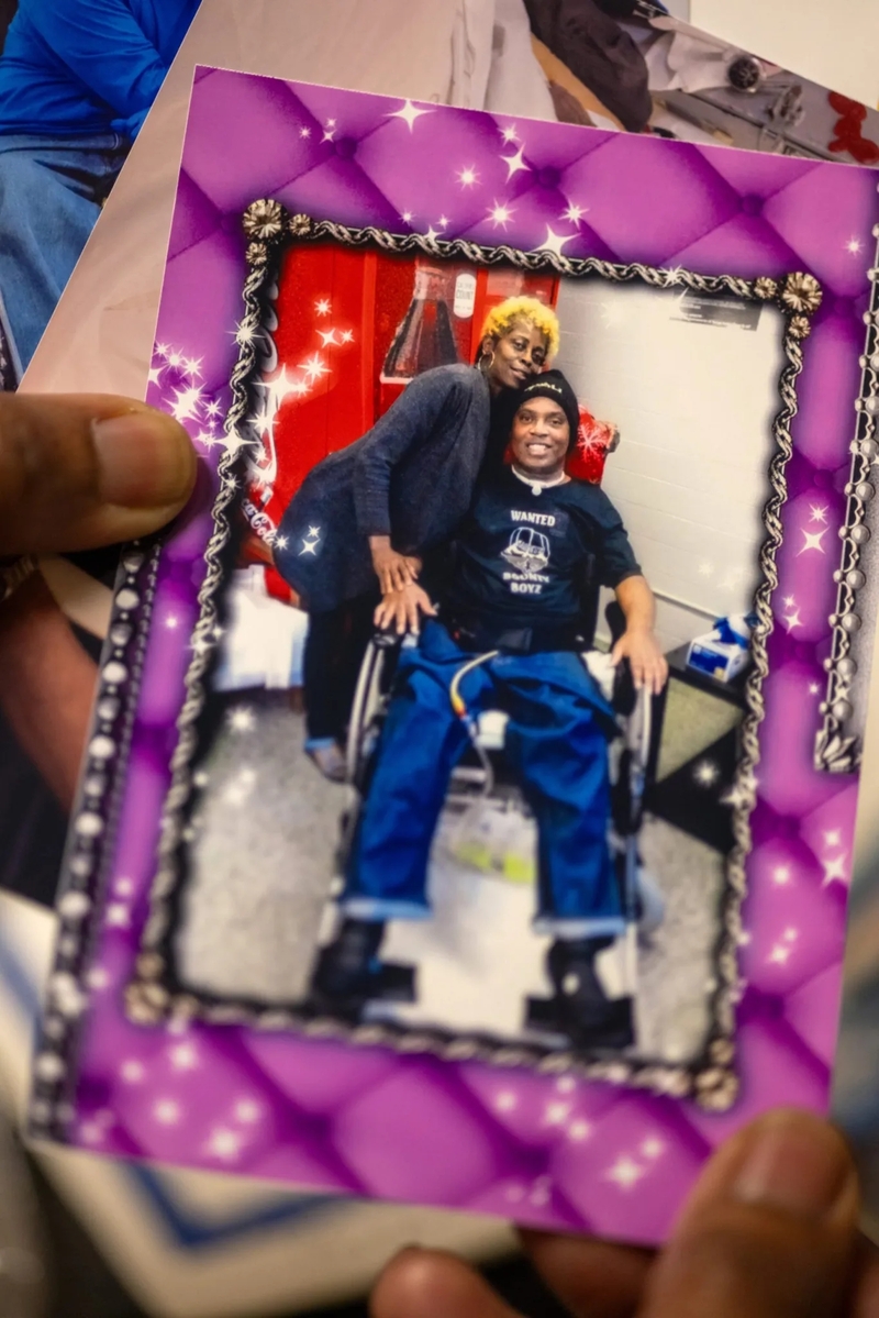 Janice Parker holds a photo of herself with her son that was taken as she visited him at Angola.