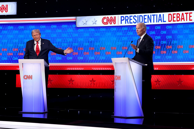 President Joe Biden, right, and the Republican presidential candidate, former President Donald Trump, participate in the CNN Presidential Debate at the CNN Studios on June 27, 2024 in Atlanta, Georgia.