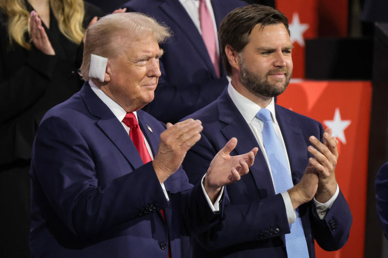 Former U.S. President Donald Trump, left, and Republican vice presidential candidate, U.S. Sen. J.D. Vance of Ohio appear on the first day of the Republican National Convention at the Fiserv Forum on July 15, 2024 in Milwaukee, Wisconsin.