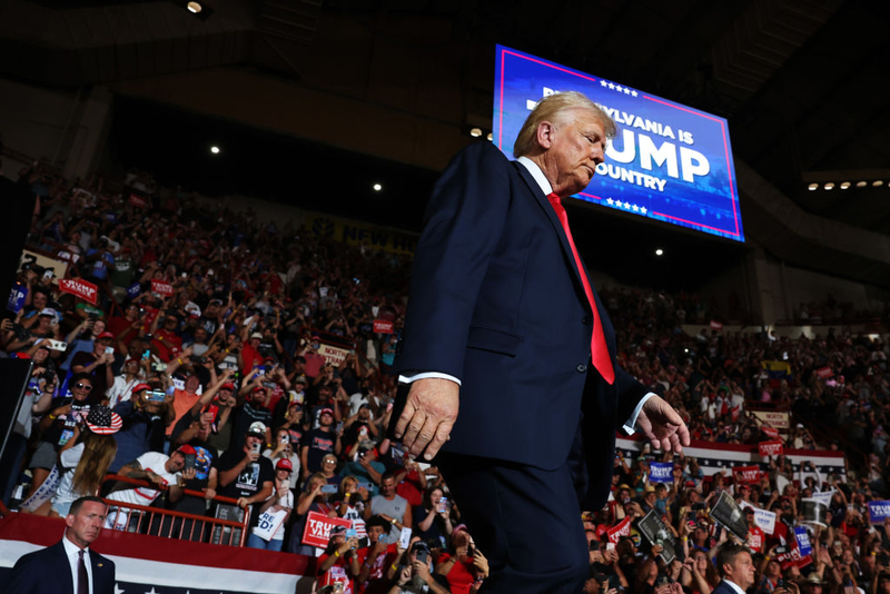 Republican presidential nominee former U.S. President Donald Trump walks onstage at a rally on July 31, 2024, in Harrisburg, Pennsylvania.