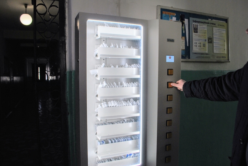 A vending machine holds syringes, condoms, and alcohol wipes.