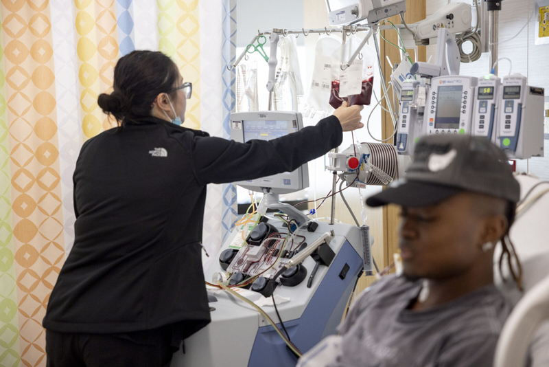 A nurse oversees the Terumo Spectra Optia Apheresis System as it collects stem cells from Daniel Cressy, 22, of Metairie, at Manning Family Children's Hospital in New Orleans