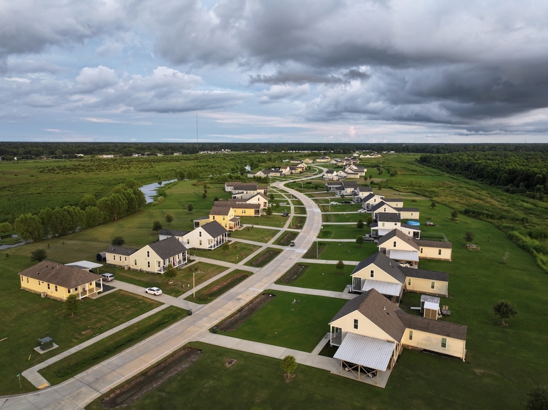 An aerial view of homes and the main street of The New Isle outside of Gray,