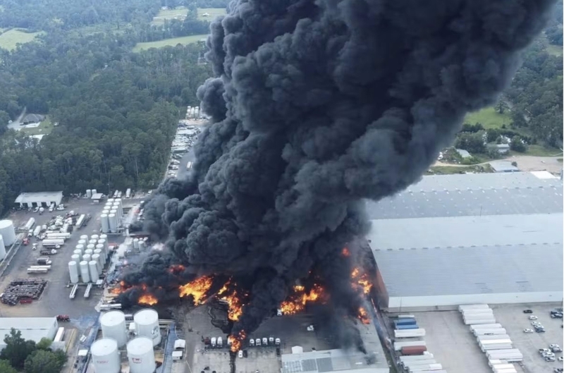 Black smoke rises from the Smitty's Supply Inc. facility in Roseland after an Aug. 22, 2025, explosion.