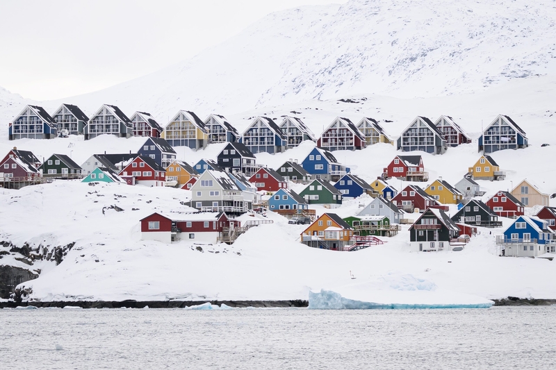 Multi-colored traditional Greenlandic homes in Nuuk, Greenland, are seen from the water on March 29, 2025. (Photo by Leon Neal/Getty Images)