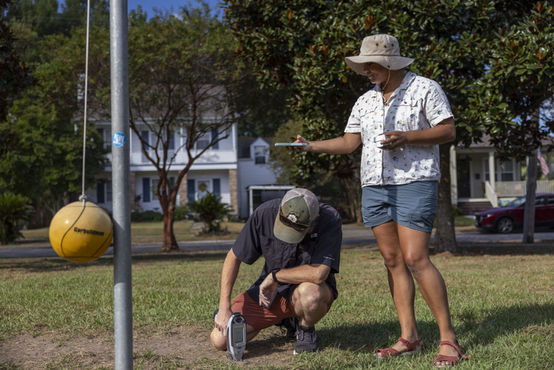 Reporter Tristan Baurick, left, tests lead levels while reporter Halle Parker maps the exact GPS coordinates of the reading at Mirabeau Playground in the Gentilly neighborhood of New Orleans on Sept. 23, 2025.