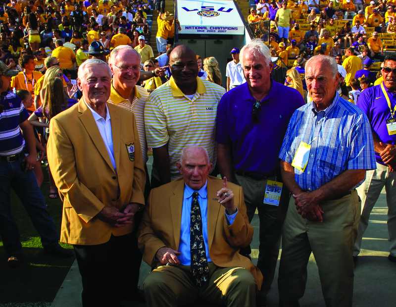 LSU football greats pose for an undated photo at Tiger Stadium: Y.A. Tittle is seated and standing, from left, are Jim Taylor, Jerry Stovall, Charles Alexander, Tommy Casanova and Billy Cannon.
