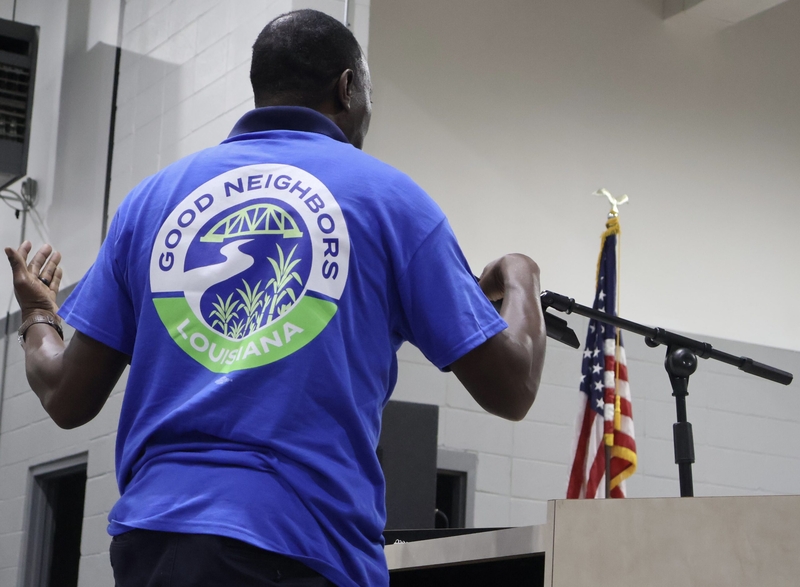 A man wears a Tshirt supporting Good Neighbors Louisiana,