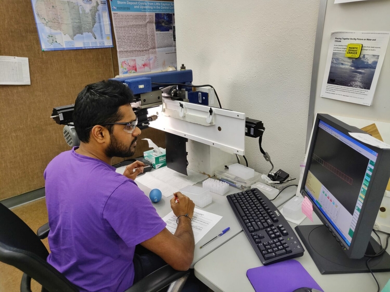 Man sits in science lab