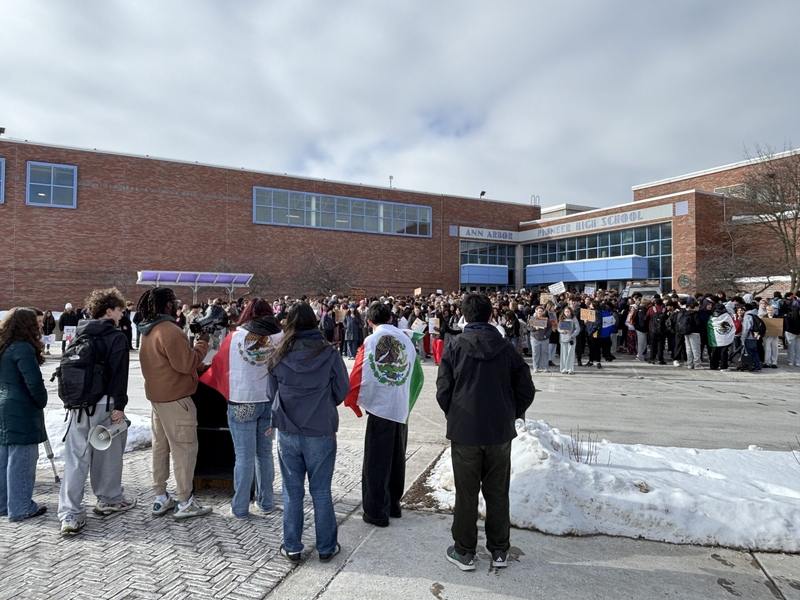 Hundreds of Ann Arbor Pioneer students leave class to protest ICE, support immigrants