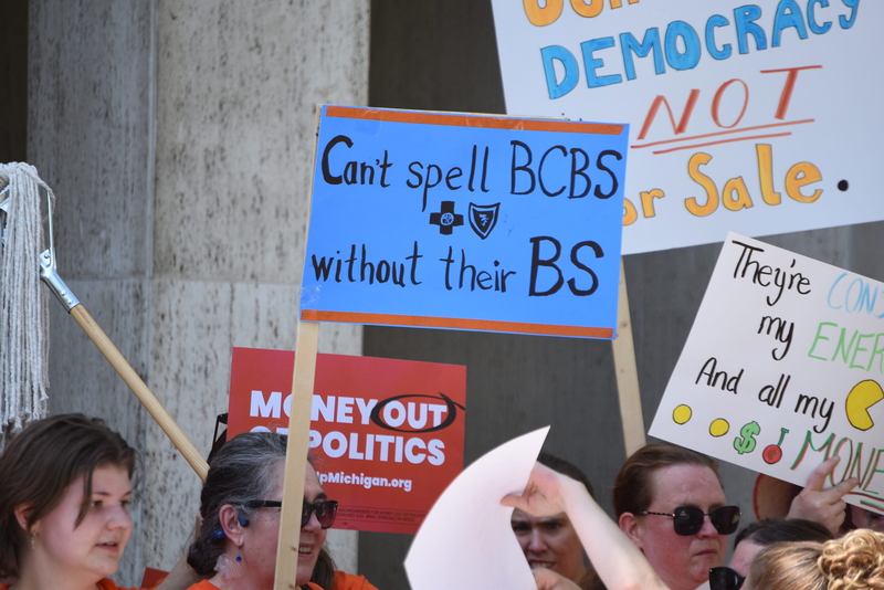 A ballot fight over corporate money in Michigan politics is coming to voters
