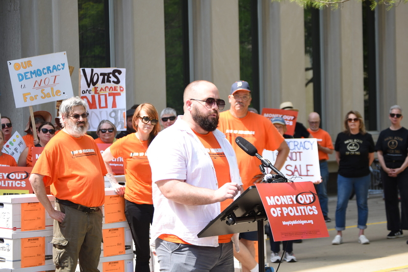 A ballot fight over corporate money in Michigan politics is coming to voters