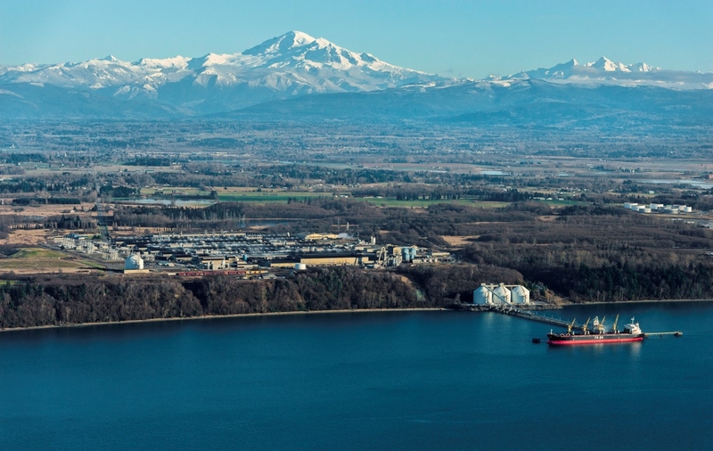 Aerial view of Alcoa’s Intalco aluminum smelter when it was operational. The smelter property is sandwiched between two oil refineries in the Cherry Point industrial zone. (Photo courtesy of Alcoa)