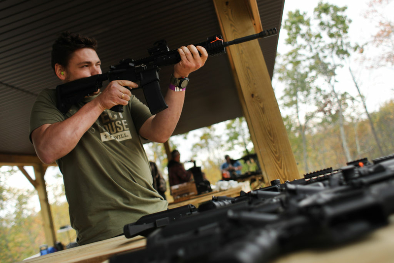 A man shoots AR-15 rifles and other weapons at a shooting range during the âRod of Iron Freedom Festivalâ on October 12, 2019 in Greeley, Pa. (Photo by Spencer Platt/Getty Images).