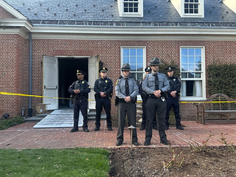 State police troopers stand outside the governor's residence on April13, 2025, after a fire led to the evacuation of Gov. Shapiro and his family. It is being investigated as arson. (Ian Karbal/Pennsylvania Capital-Star)