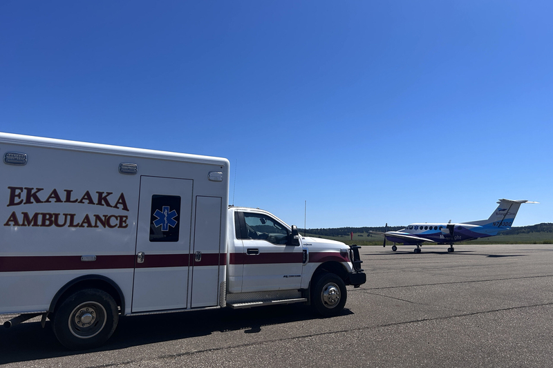 An Ekalaka ambulance meets a medevac plane from Billings Clinic — which offers the highest level of care in Montana — at the municipal airport. The flight takes an hour, about a quarter of what it takes an ambulance to drive. (Arielle Zionts/KFF Health News)