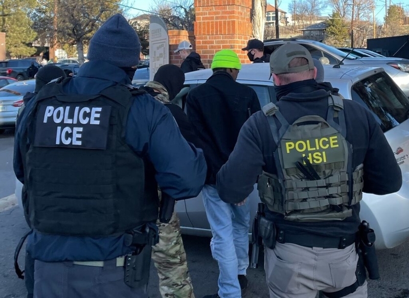 Federal agents take a man into custody in Denver, in a photo posted to social media by the Denver field office of Immigration and Customs Enforcement on Feb. 5, 2025. Denver Mayor Mike Johnston advised peers at a U.S. Conference of Mayors meeting to think about how to help their constituents while navigating federal pressure on immigration enforcement. (ICE)