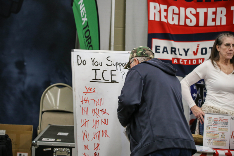 A man at the NRA's Great American Outdoor Show at the Farm Show complex in Harrisburg, shows his support for ICE. The whiteboard was in front of a voter registration booth, on Feb. 11, 2026. (Photo by Tim Lambert/Pennsylvania Capital-Star)