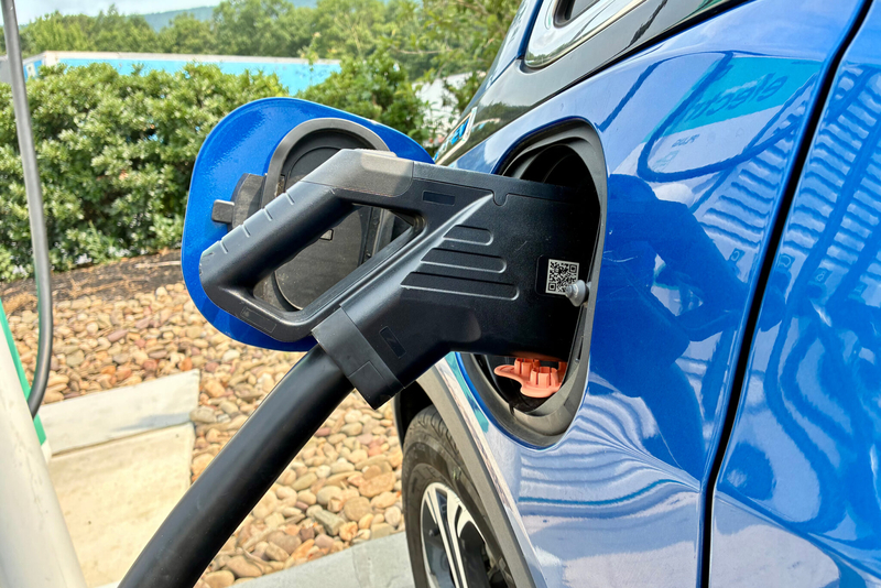Many EVs, like the 2017 Chevrolet Bolt, are not compatible with Tesla Superchargers, the nation’s largest network of charging stations. Experts say that’s why federal funding for EV charging has focused on stations that are compatible with all makes and models. (Photo by Kyle Bagenstose/Inside Climate News)