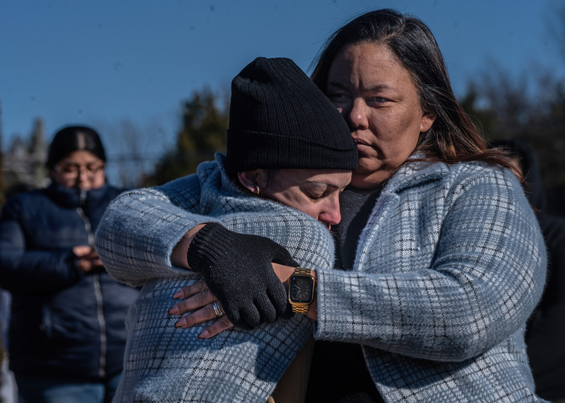 Dasia Pietez, right, embraces her daughter Dulce Acevedo, as the pair wait to be reunited with Pietez's younger daughter at Antioch High School on January 22, 2025. (Photo: John Partipilo)