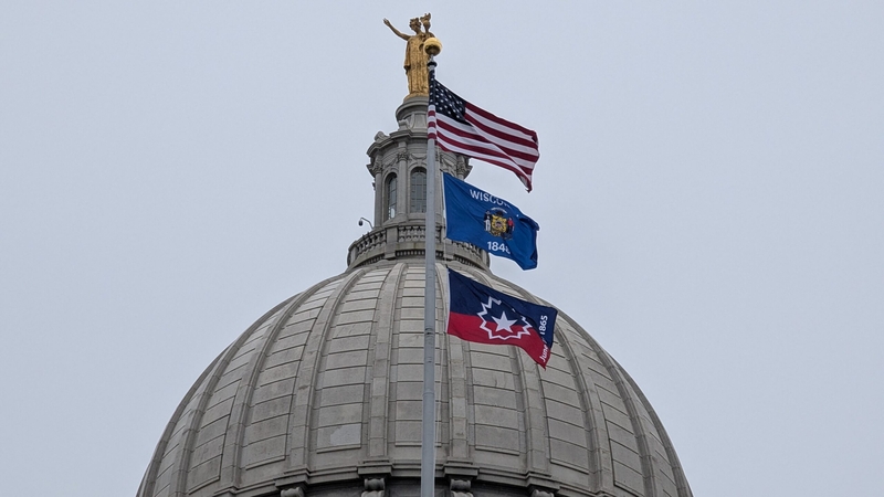 Evers raises Juneteenth flag over Wisconsin Capitol, honors the late Michael Johnson