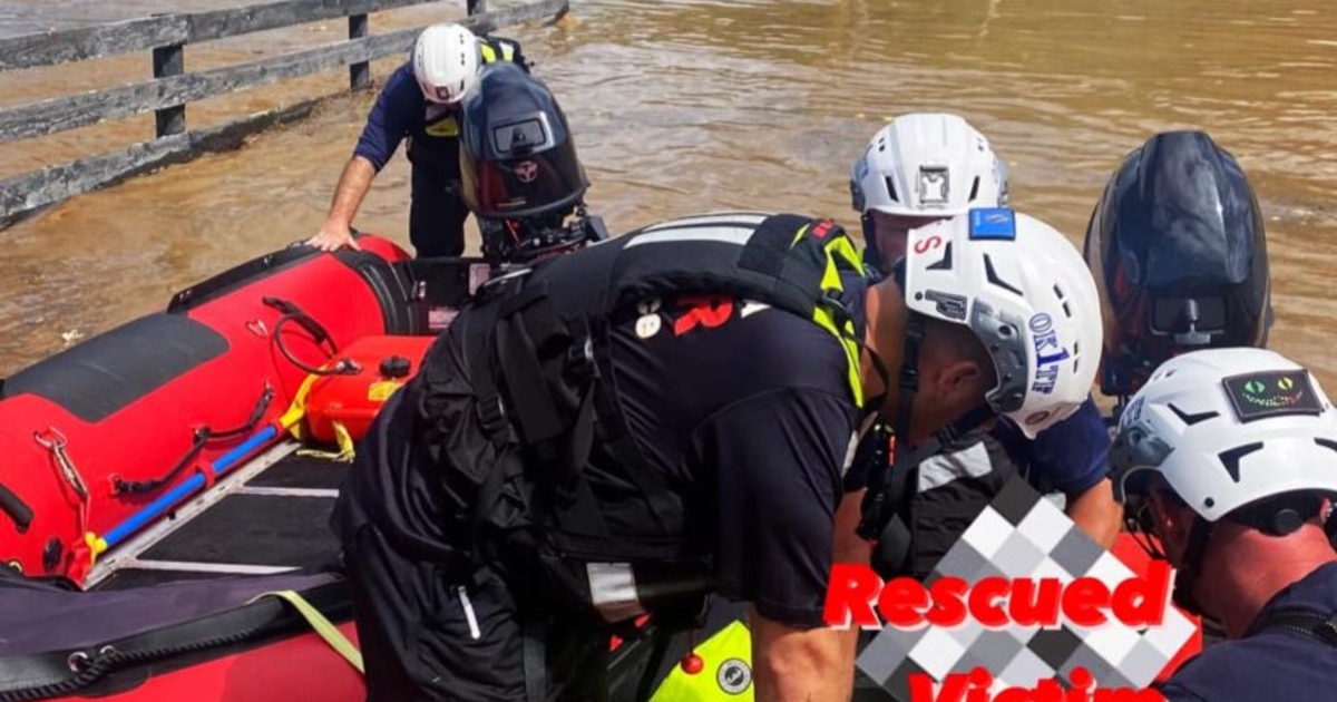 Water Rescue Ok Sign Oklahoma swift water rescue team rescues four people trapped in ...