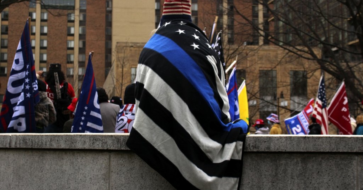 Western Inserection Flag The thin blue line flag: symbol of police pride or violent insurrection ...